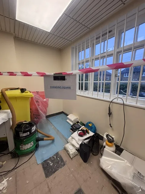 Asbestos floor tile and bitumen removal in Putney